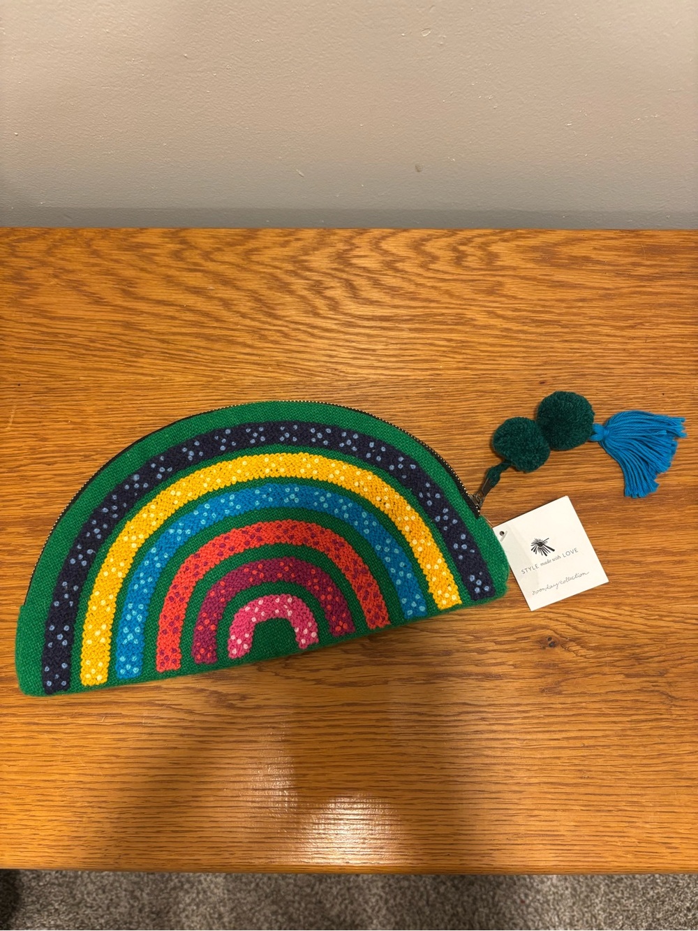 Noonday Collection Wool Rainbow Clutch with Green Trim and Blue Tassel